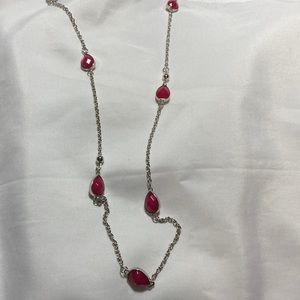 Long silver necklace with pink stones